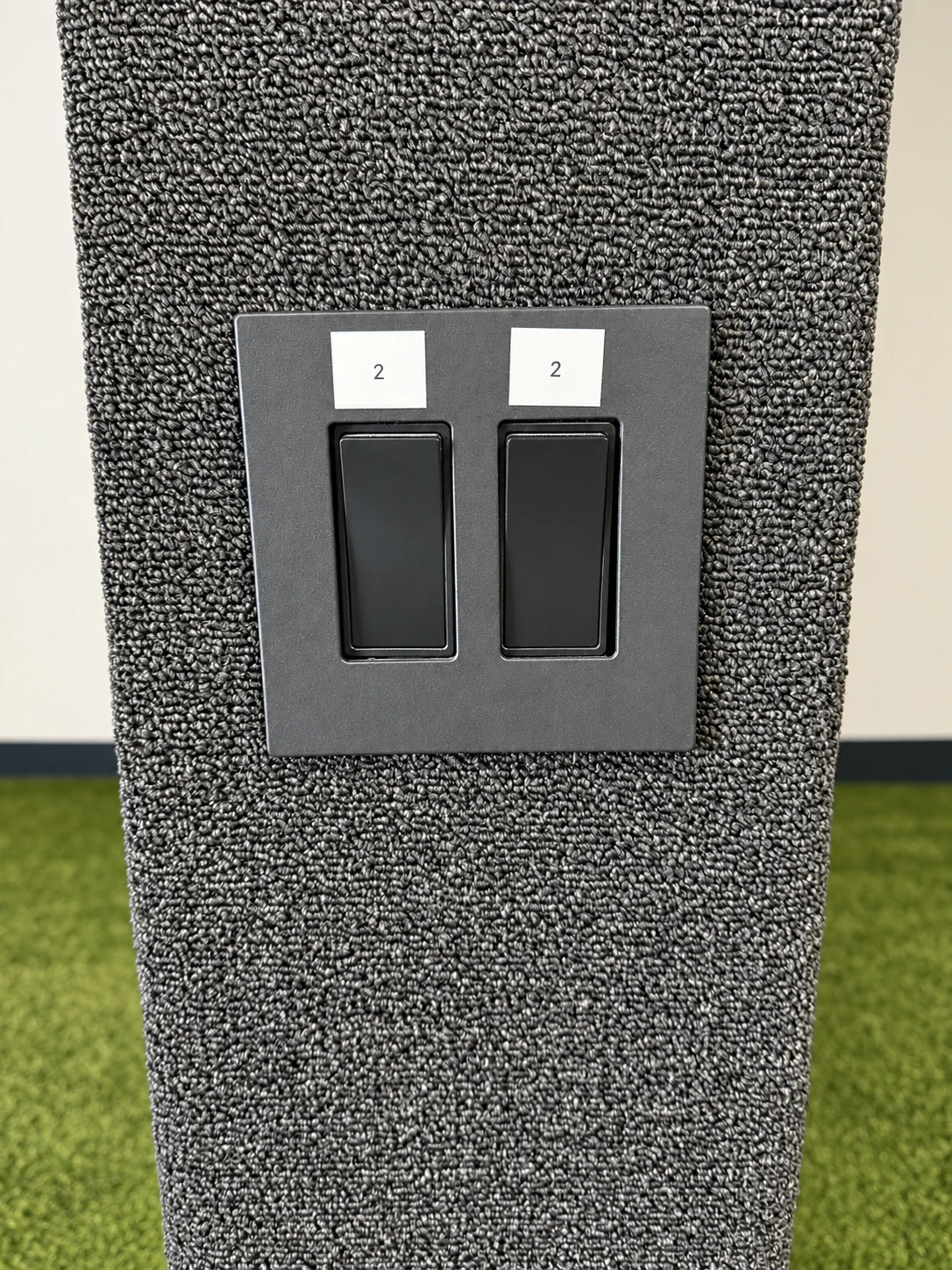Two switches labeled 2 on the center divider
